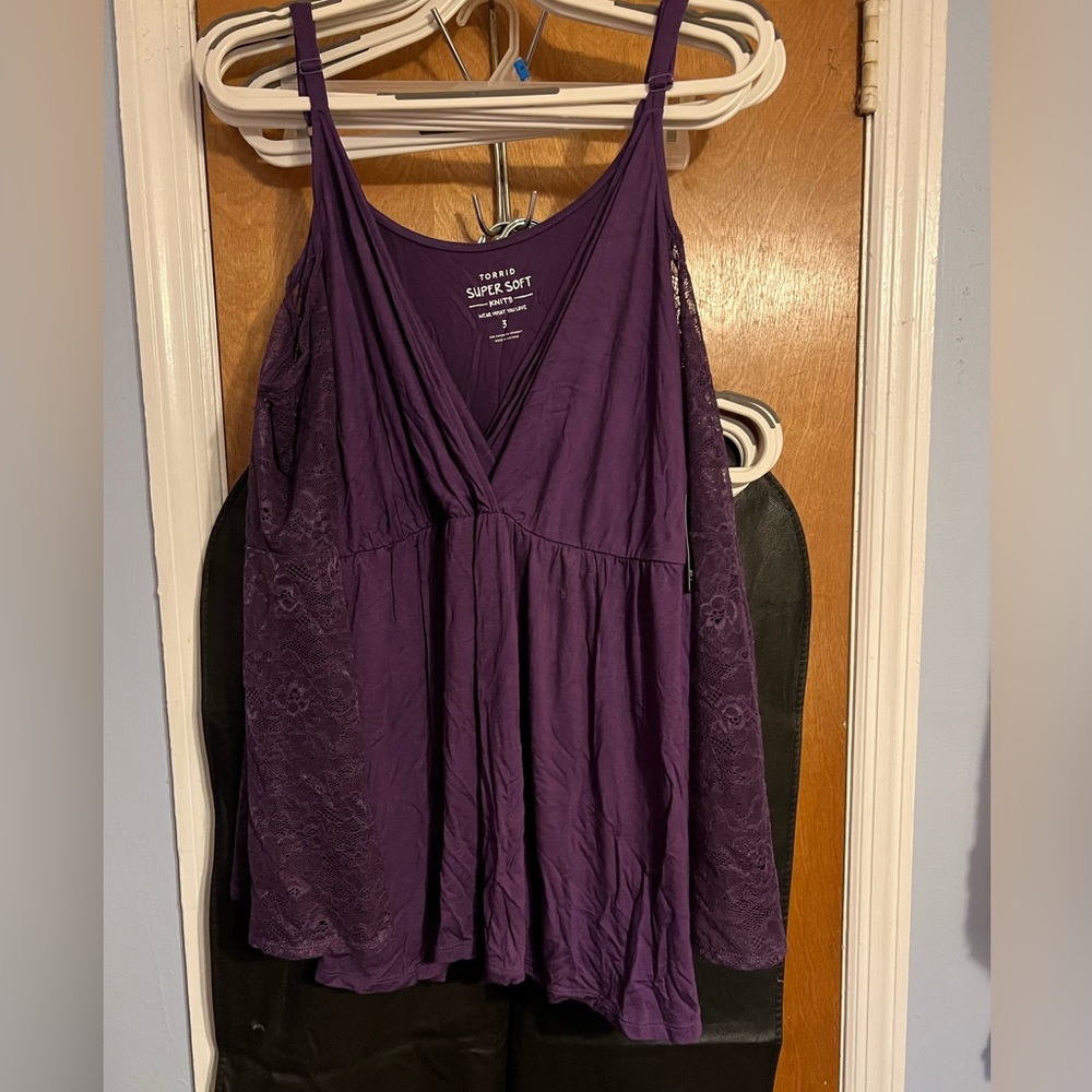 Purple knit top with off shoulder lace sleeves